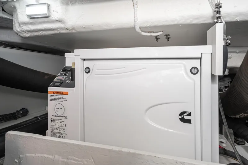 Slide: The Image of Cummins generator in the engine room of 2020 Tiara Yachts C39 Coupe. - 46