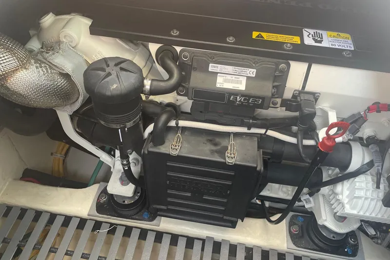 Slide: The Image of Engine compartment of a 2020 Tiara Yachts C39 Coupe, showcasing mechanical components. - 48