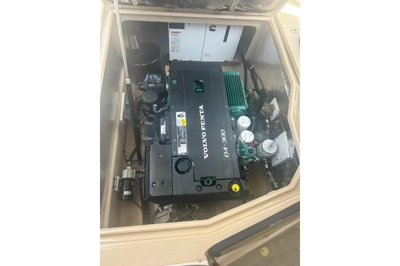 Slide: The Image of Engine compartment of 2019 Ranger Tugs R-31-S with Volvo Penta D4-300 engine. - 23