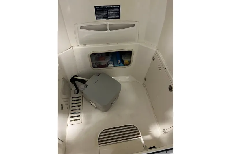 Slide: The Image of Interior of 2014 Boston Whaler 280 Outrage boat with storage and equipment. - 6