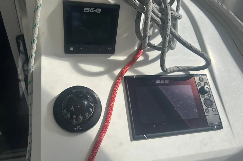 Slide: The Image of B&G navigation instruments on 2020 Beneteau Oceanis 30.1 yacht, featuring compass and ropes. - 13