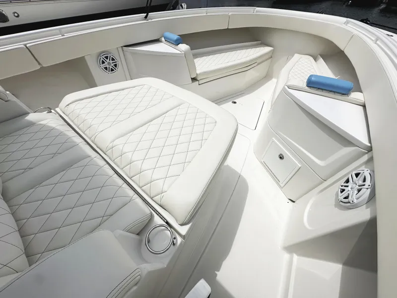 Slide: The Image of Luxurious interior of 2018 HCB 39 Speciale boat with white quilted seating. - 28