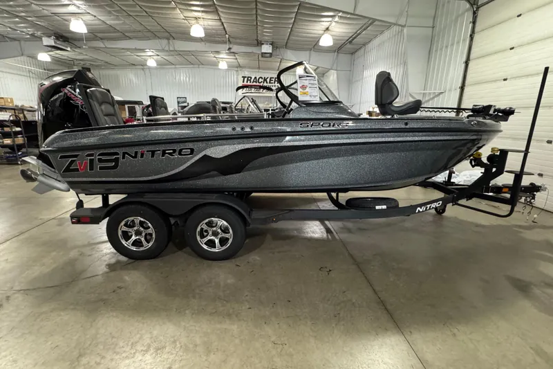 The Image of 2026 Nitro ZV19 Sport boat on trailer in indoor showroom. - 0