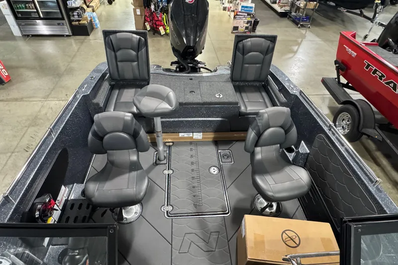 Slide: The Image of 2026 Nitro ZV19 Sport boat interior with four cushioned seats and storage compartments. - 16