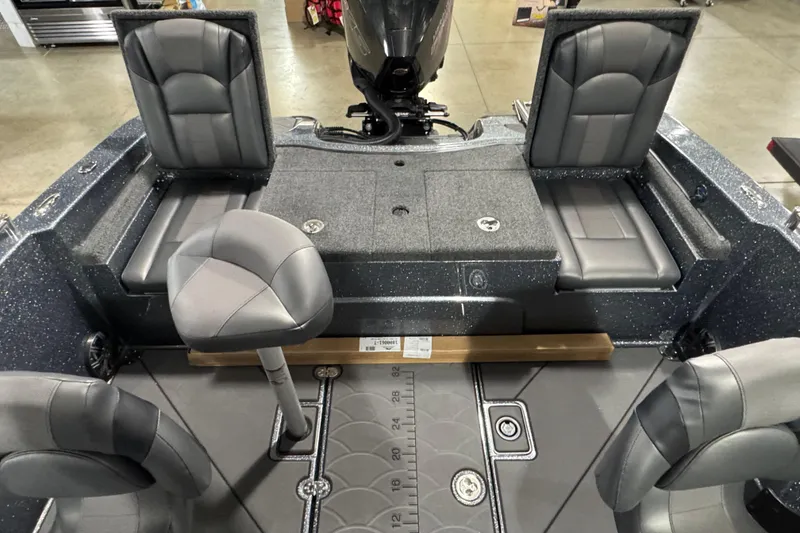Slide: The Image of 2026 Nitro ZV19 Sport boat interior with gray seating and sleek design. - 5