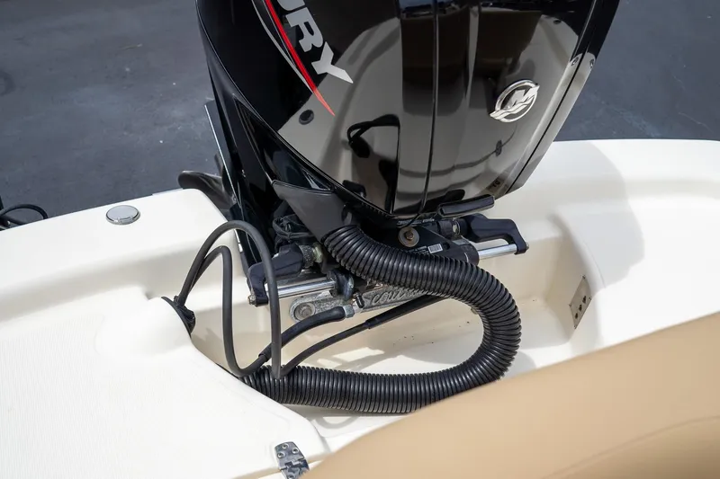 Slide: The Image of 2019 Scout 177 Sportfish Flats boat with Mercury outboard motor detail. - 13