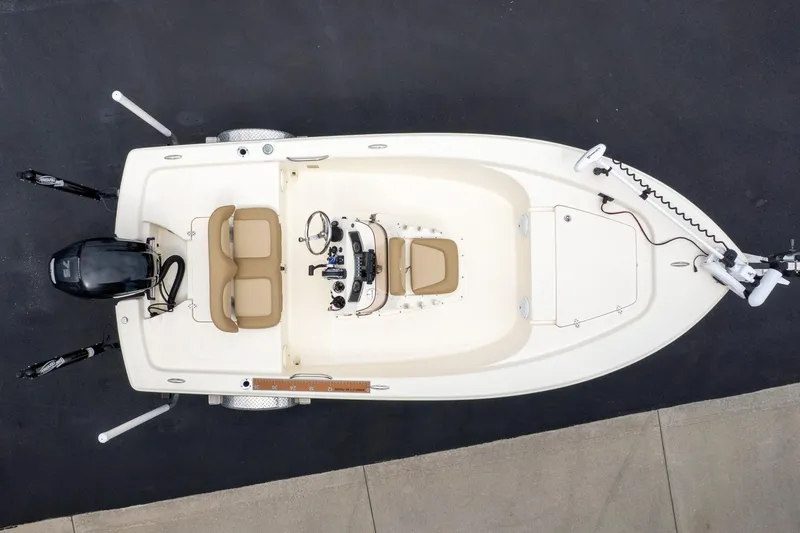 Slide: The Image of Overhead view of 2019 Scout 177 Sportfish Flats boat on pavement. - 6