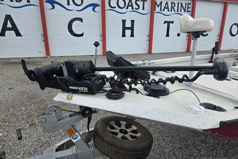 Slide: The Image of 2017 Ranger RB190 Bay boat with Minn Kota Ulterra trolling motor at a marine facility. - 4