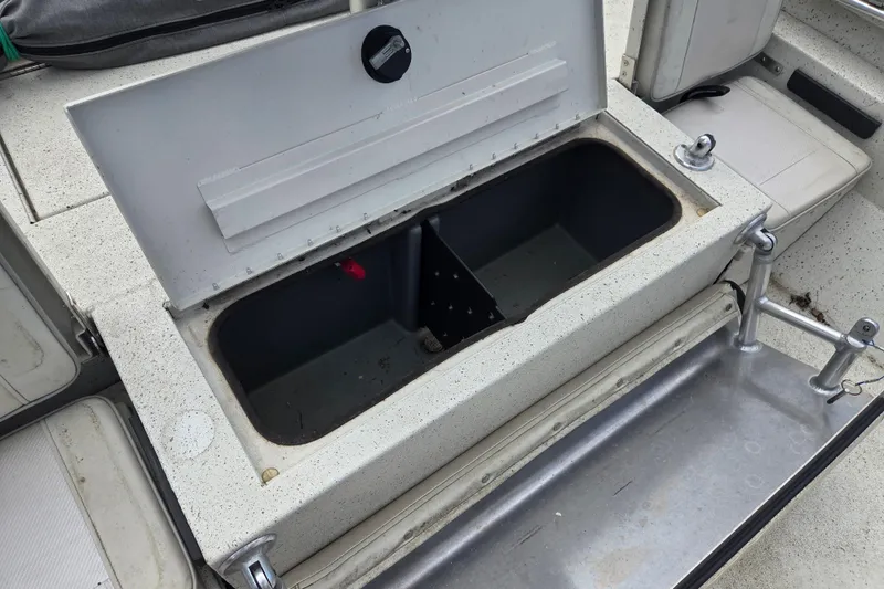 Slide: The Image of Open storage compartment on 2017 Ranger RB190 Bay boat deck. - 8