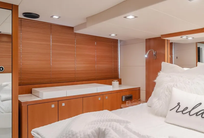 Slide: The Image of Luxurious interior of 2012 Sunseeker Portofino 48 yacht with cozy bedroom decor. - 14
