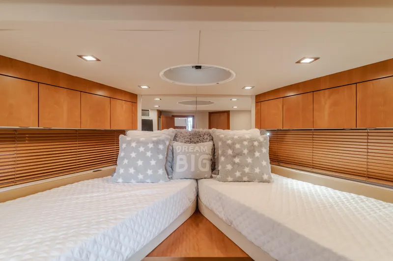 Slide: The Image of Luxurious interior of 2012 Sunseeker Portofino 48 yacht with twin beds and stylish decor. - 19