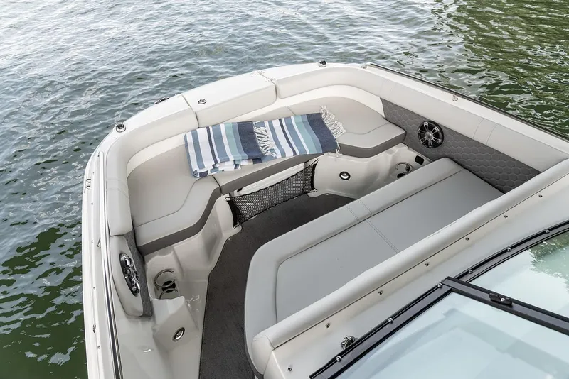 Slide: The Image of Manufacturer Provided Image: 2024 Sea Ray SDX 250 boat interior with seating and striped towel. - 6