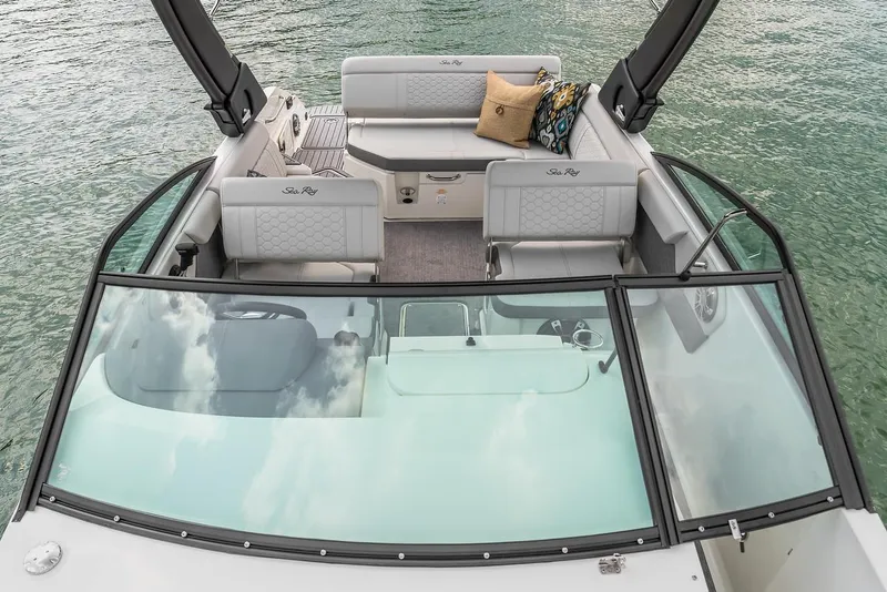 Slide: The Image of Manufacturer Provided Image: 2024 Sea Ray SDX 250 boat interior with seating and cushions on the water. - 7