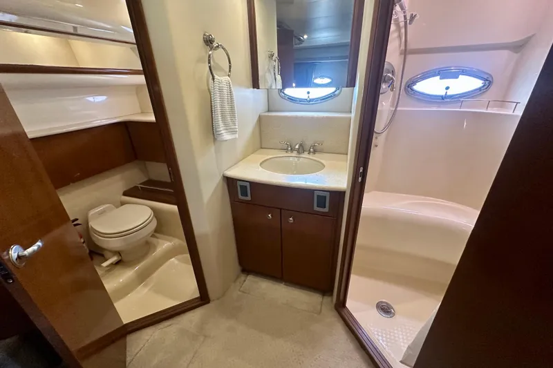 Slide: The Image of Luxurious bathroom in 2005 Meridian 459 Motoryacht with shower, sink, and toilet. - 31