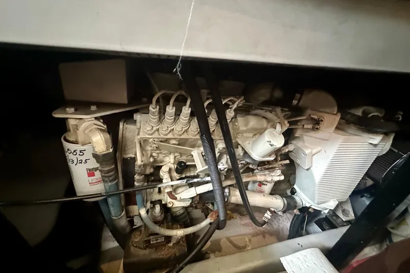 Slide: The Image of Engine compartment of a 2005 Meridian 459 Motoryacht, showcasing mechanical components. - 34