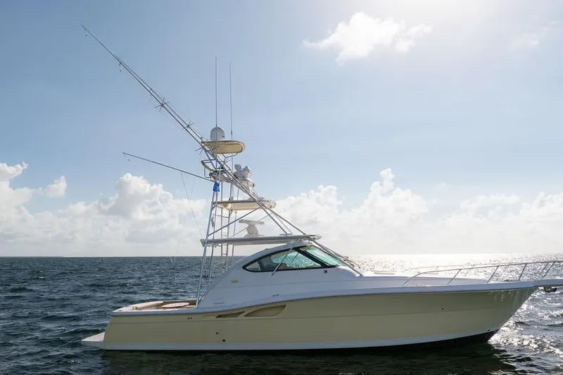 The Image of 2005 Tiara Yachts 4200 Open cruising on the ocean under a clear sky. - 0