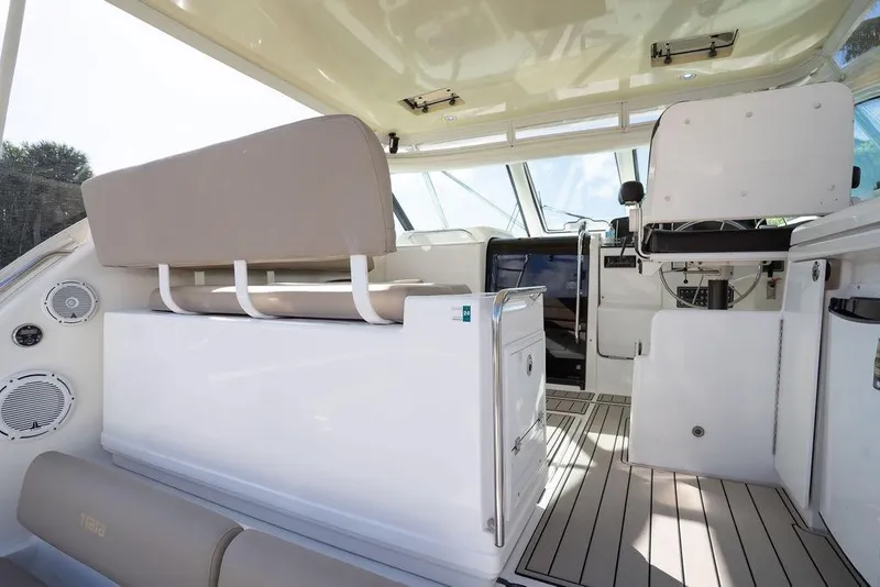 Slide: The Image of Interior view of 2005 Tiara Yachts 4200 Open, featuring helm and seating area. - 31