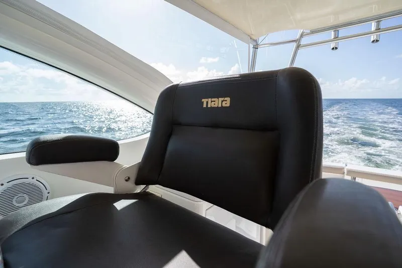Slide: The Image of Captain's chair on 2005 Tiara Yachts 4200 Open, overlooking ocean waves. - 32