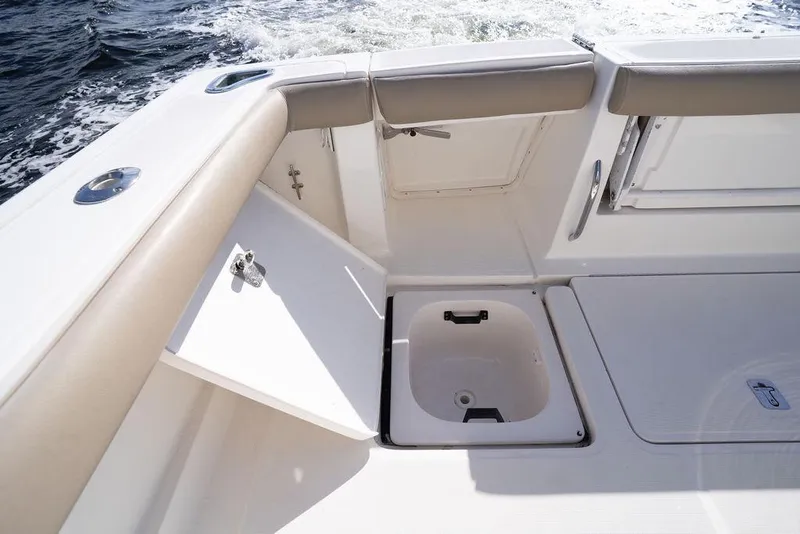 Slide: The Image of 2005 Tiara Yachts 4200 Open cockpit with storage compartments and seating. - 39