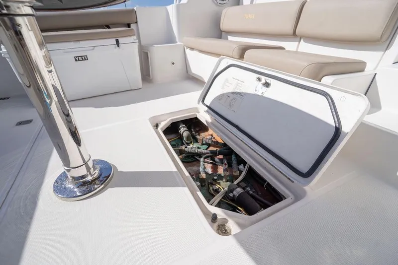 Slide: The Image of 2005 Tiara Yachts 4200 Open deck with open hatch and seating area. - 44