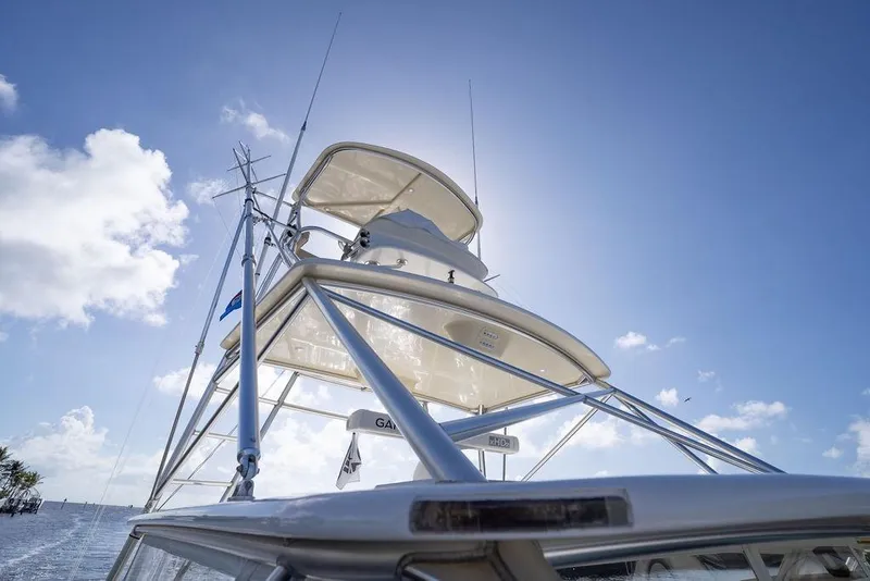 Slide: The Image of 2005 Tiara Yachts 4200 Open against a bright blue sky. - 46