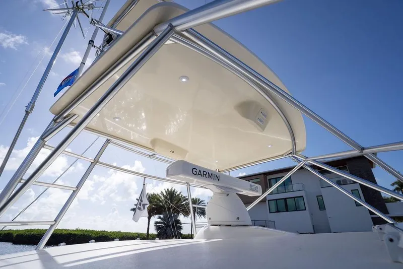 Slide: The Image of 2005 Tiara Yachts 4200 Open with Garmin radar, viewed from below against blue sky. - 49