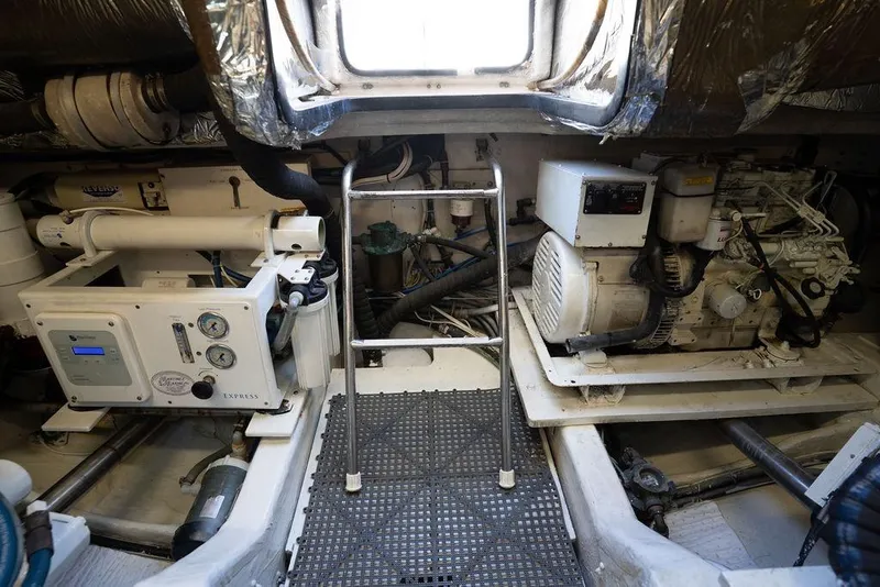 Slide: The Image of Engine room of 2005 Tiara Yachts 4200 Open, featuring machinery and equipment. - 56