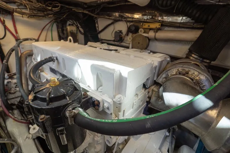 Slide: The Image of Engine compartment of a 2005 Tiara Yachts 4200 Open, showcasing mechanical components. - 58