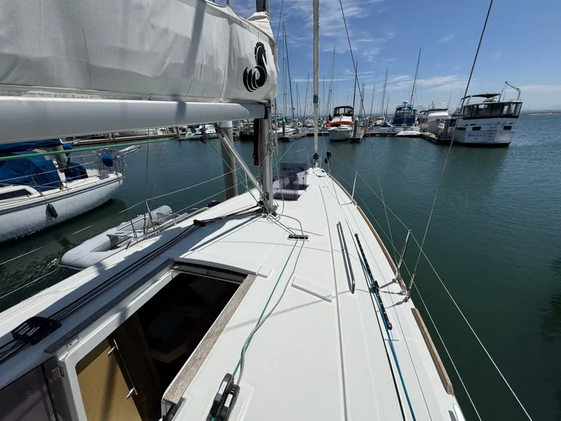 Slide: The Image of Beneteau Oceanis 35.1 sailboat docked in marina, 2021 model, sunny day. - 19