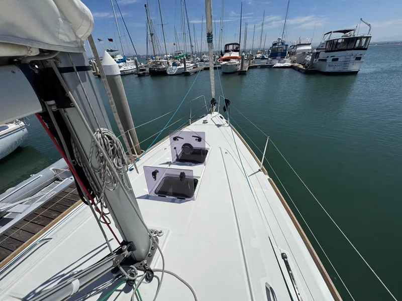 Slide: The Image of Beneteau Oceanis 35.1 sailboat docked at marina, 2021 model, sunny day. - 20