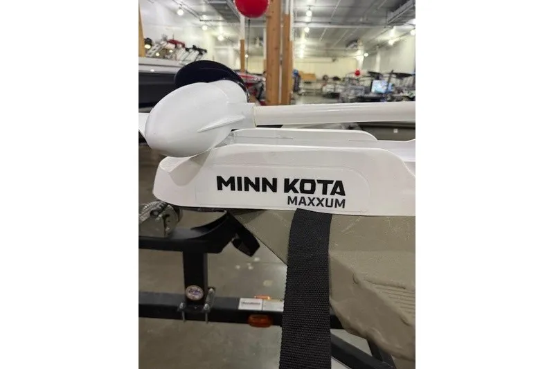 Slide: The Image of Minn Kota Maxxum motor on 2017 Tracker Grizzly 1754 MVX SC boat in showroom. - 7