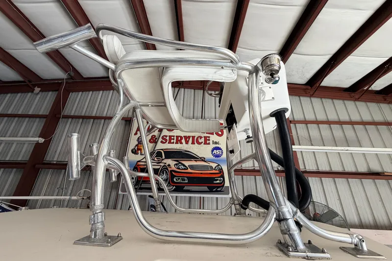 Slide: The Image of Aluminum boat tower on 2010 Canyon Bay 24H, inside a service garage. - 101