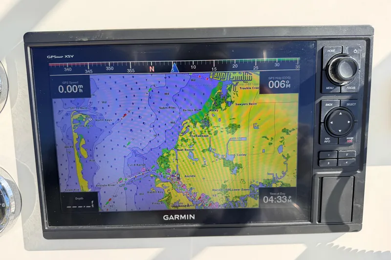 Slide: The Image of Garmin GPS display on 2010 Canyon Bay 24H boat showing nautical map and navigation data. - 33