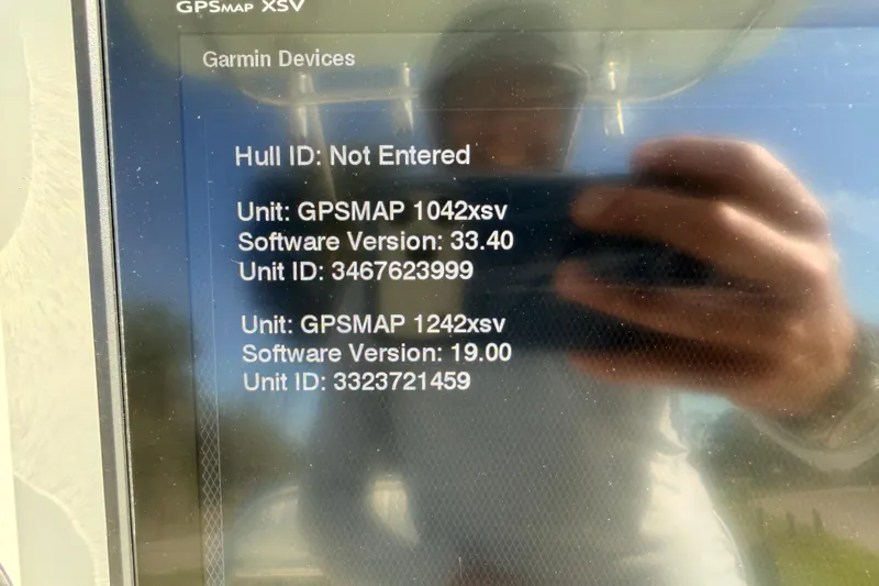 Slide: The Image of Garmin GPS display on a 2010 Canyon Bay 24H boat, showing unit details. - 34