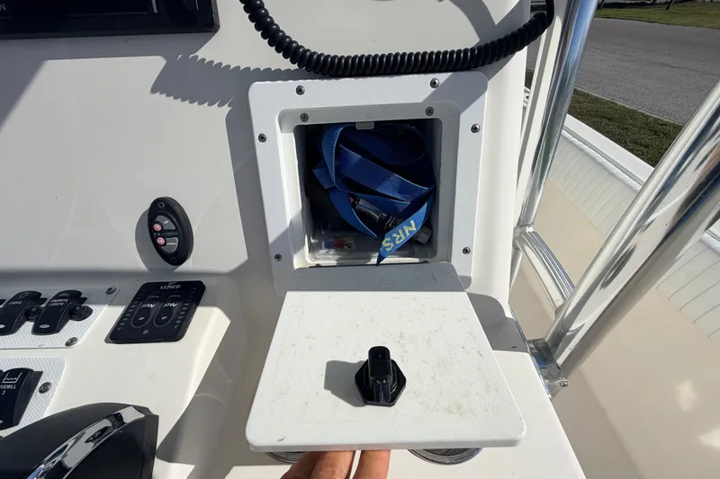 Slide: The Image of Canyon Bay 24H boat console with storage compartment and control panel, 2010 model. - 39
