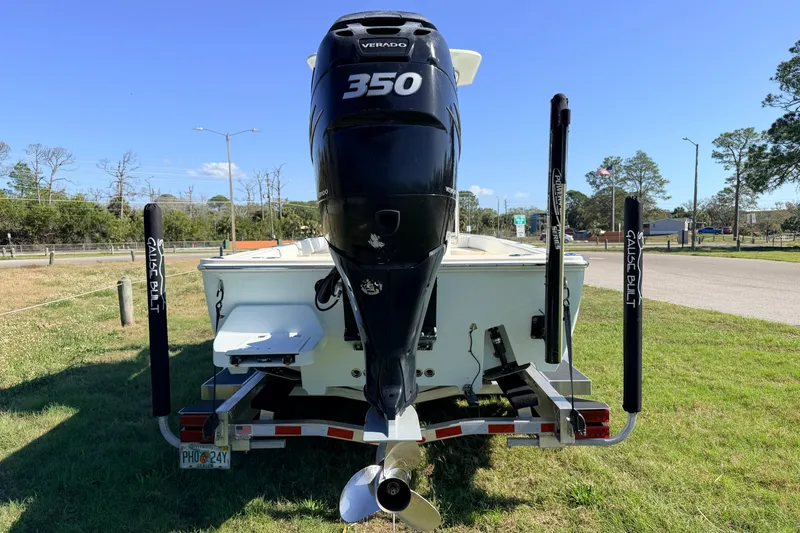 Slide: The Image of 2010 Canyon Bay 24H boat with powerful 350 Verado engine on trailer. - 7