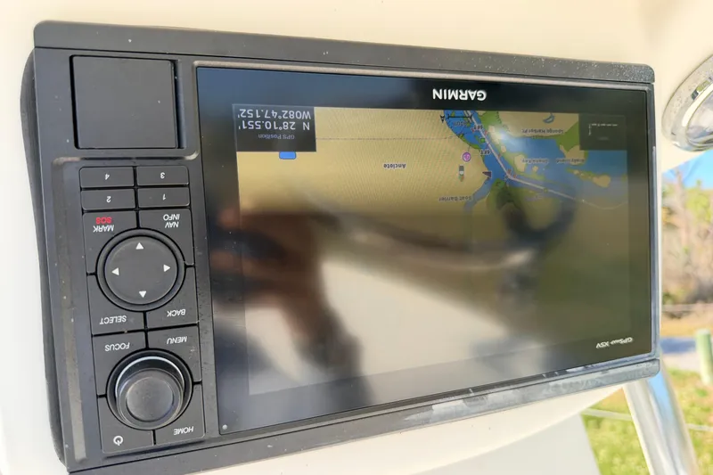 Slide: The Image of Garmin GPS display on 2010 Canyon Bay 24H boat, showing navigational map. - 82