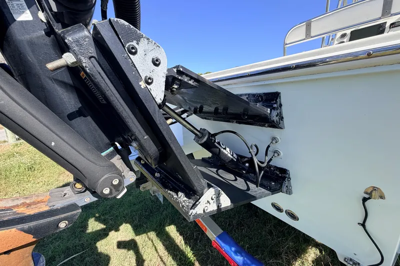 Slide: The Image of Canyon Bay 24H 2010 boat engine mount detail with hydraulic components. - 9