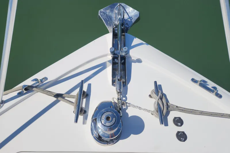 Slide: The Image of Bow of 2018 Viking 48 Sport Tower with anchor and mooring ropes. - 106