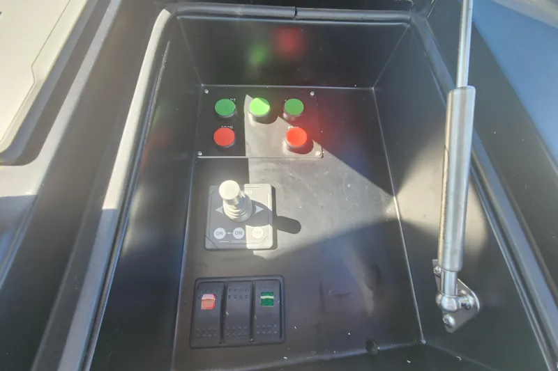 Slide: The Image of Control panel of a 2018 Viking 48 Sport Tower with buttons and joystick. - 118
