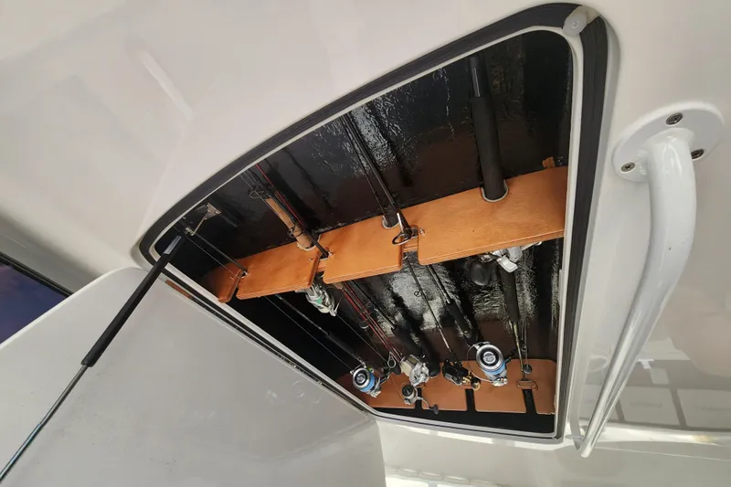 Slide: The Image of Fishing rod storage on a 2018 Viking 48 Sport Tower boat. - 128