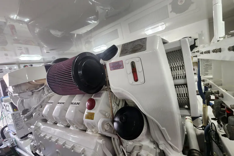 Slide: The Image of Engine room of 2018 Viking 48 Sport Tower with MAN engine components. - 159