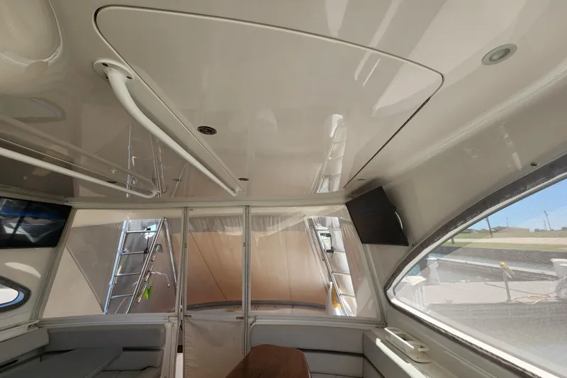 Slide: The Image of Interior view of 2018 Viking 48 Sport Tower yacht, featuring sleek design and modern amenities. - 31