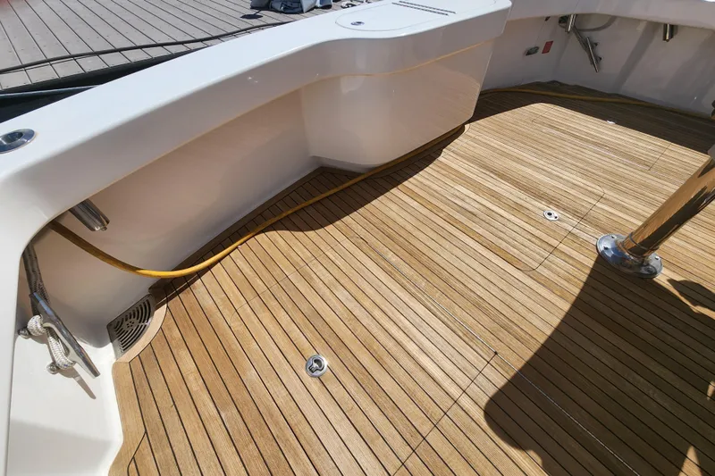 Slide: The Image of Teak deck of 2018 Viking 48 Sport Tower yacht, showcasing sleek design and craftsmanship. - 89