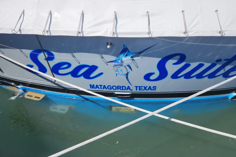 Slide: The Image of 2018 Viking 48 Sport Tower boat named "Sea Suite" in Matagorda, Texas marina. - 9