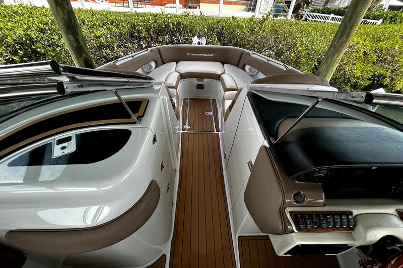 Slide: The Image of 2017 Crownline Eclipse E29 XS boat interior with sleek seating and modern dashboard. - 12
