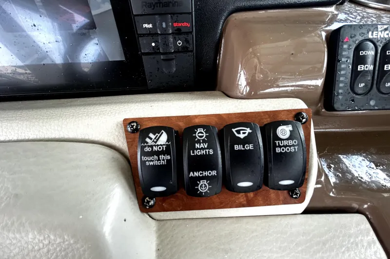 Slide: The Image of Control panel of a 2017 Crownline Eclipse E29 XS boat with labeled switches. - 30