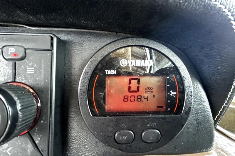 Slide: The Image of Yamaha tachometer display on 2017 Crownline Eclipse E29 XS boat dashboard. - 34