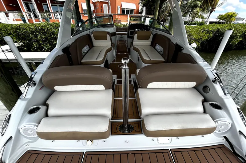 Slide: The Image of 2017 Crownline Eclipse E29 XS boat interior with luxurious seating and sleek design. - 48