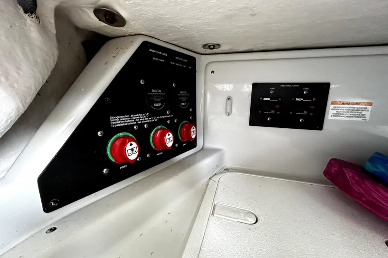 Slide: The Image of 2017 Crownline Eclipse E29 XS boat control panel with switches and indicators. - 59